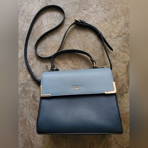 Dune London Satchel. Blue/White block coloring. Gold detail.